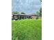 Beautifully landscaped backyard with patio, ideal for relaxing at 3130 Taylor Rd, Columbus, IN 47203