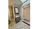 Updated bathroom with unique patterned flooring and updated fixtures at 3130 Taylor Rd, Columbus, IN 47203