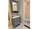 Bathroom featuring a stylish vanity with a framed mirror at 3130 Taylor Rd, Columbus, IN 47203