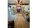 Spacious living room with fireplace, built-ins, hardwood flooring and beamed ceiling at 3130 Taylor Rd, Columbus, IN 47203