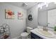 Cozy bathroom with decorative accents and modern fixtures at 317 Virginia St, Fortville, IN 46040