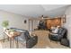 Inviting living room with a ceiling fan, TV, and stylish furnishings at 317 Virginia St, Fortville, IN 46040