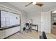 Well-lit home office featuring whiteboard and desk, perfect for focused work and collaboration at 317 Virginia St, Fortville, IN 46040