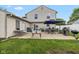 Spacious patio with grills and seating, ideal for outdoor cooking at 317 Virginia St, Fortville, IN 46040