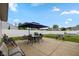Relaxing patio with outdoor seating, perfect for entertaining guests at 317 Virginia St, Fortville, IN 46040