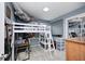 Nicely appointed bedroom featuring a bunk bed with a small desk underneath and blue walls at 333 N Windswept Rd, Greenfield, IN 46140