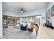 Open bonus room featuring built-in shelving, unique flooring and lots of natural light from the sliding glass doors at 333 N Windswept Rd, Greenfield, IN 46140