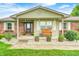 Charming front porch area with decorative accents and a welcoming entrance at 333 N Windswept Rd, Greenfield, IN 46140