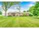 Beautiful one story home boasting a lush lawn, mature trees, and inviting curb appeal at 333 N Windswept Rd, Greenfield, IN 46140
