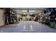 Spacious garage with epoxy flooring and ample storage, ideal for projects and organization at 333 N Windswept Rd, Greenfield, IN 46140