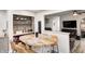 Bright kitchen featuring a breakfast nook with seating and an open view into the Gathering room at 333 N Windswept Rd, Greenfield, IN 46140