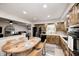 Charming kitchen featuring wooden cabinets, modern appliances, and a cozy breakfast nook at 333 N Windswept Rd, Greenfield, IN 46140