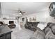 Spacious living room boasts a fireplace and comfortable seating, creating a warm and inviting atmosphere at 333 N Windswept Rd, Greenfield, IN 46140