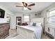 Neutral toned main bedroom with a closet and large windows for an abundance of natural light at 333 N Windswept Rd, Greenfield, IN 46140