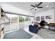 Bright sunroom with sliding glass doors leading to the yard, perfect for relaxation and entertainment at 333 N Windswept Rd, Greenfield, IN 46140