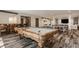 Spacious finished basement with a pool table, ping pong table, and bar area at 3675 Dartmoor Way, Zionsville, IN 46077