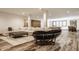 Large basement area showcases a sectional sofa, unique seating, and open layout for entertainment and relaxation at 3675 Dartmoor Way, Zionsville, IN 46077