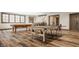Expansive basement featuring a pool table, ping pong table, and stylish flooring at 3675 Dartmoor Way, Zionsville, IN 46077