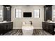 Luxurious bathroom featuring a freestanding tub, dark wood cabinets, and modern finishes at 3675 Dartmoor Way, Zionsville, IN 46077