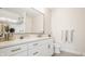 Clean, modern bathroom with a marble vanity, decorative mirror, and glass shower at 3675 Dartmoor Way, Zionsville, IN 46077