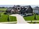 Gorgeous home featuring a well-manicured lawn and stylish curb appeal at 3675 Dartmoor Way, Zionsville, IN 46077