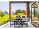 Enjoy outdoor dining on the patio with a view of the lush green lawn and neighborhood at 3675 Dartmoor Way, Zionsville, IN 46077
