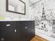 Bathroom featuring a black vanity with a white countertop and an Eiffel Tower shower curtain at 4025 Main St, Anderson, IN 46013