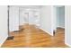 Hallway featuring hardwood floors and neutral walls at 4025 Main St, Anderson, IN 46013