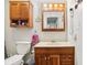 Bathroom featuring a classic vanity with a white countertop and wood cabinetry at 409 N Sycamore St, Martinsville, IN 46151