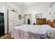 This bedroom has a very large closet and laminate wood flooring at 409 N Sycamore St, Martinsville, IN 46151