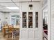 Dining room with built-in china cabinet and access to living room at 409 N Sycamore St, Martinsville, IN 46151