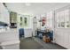 Bright laundry room with abundant light and ample appliance and pantry storage at 409 N Sycamore St, Martinsville, IN 46151