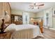 The main bedroom has newer flooring and a ceiling fan at 409 N Sycamore St, Martinsville, IN 46151