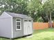 Well-maintained storage shed in the backyard, providing ample space for tools and equipment at 4445 Kingsley Dr, Indianapolis, IN 46205
