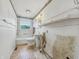 A bathroom featuring a sink, toilet and tub at 4648 Brookville Rd, Indianapolis, IN 46201