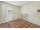 A bedroom with natural light from one window at 4648 Brookville Rd, Indianapolis, IN 46201