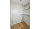 Unfinished walk-in closet with built-in shelving for customizable storage solutions at 4648 Brookville Rd, Indianapolis, IN 46201