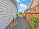 View of the driveway between two buildings showing access and property lines at 4648 Brookville Rd, Indianapolis, IN 46201