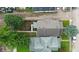 Aerial view of residential area showing rooftops, tree canopies, backyard decks, and neighborhood street layout at 517 N Alton Ave, Indianapolis, IN 46222