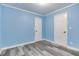 Bedroom showcasing new floors, fresh paint, doors and trim, and neutral colors creating a blank slate at 517 N Alton Ave, Indianapolis, IN 46222
