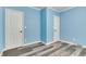 Bedroom showing new floors, fresh paint, doors and trim, and neutral colors creating a welcoming space at 517 N Alton Ave, Indianapolis, IN 46222