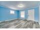 Bright living room with fresh paint, new floors, and natural light, perfect for relaxation at 517 N Alton Ave, Indianapolis, IN 46222