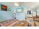 Bright living room featuring a view to the kitchen, with simple decor and neutral tones at 524 S Arlington Ave, Indianapolis, IN 46219
