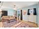 Inviting living room with comfortable seating, wood floors, and natural light at 524 S Arlington Ave, Indianapolis, IN 46219