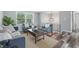 Cozy living room with modern furnishings, hardwood floors, and plenty of natural light at 5503 Antoneli Ln, Indianapolis, IN 46237
