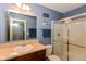 Clean bathroom with glass-enclosed shower and updated vanity at 5775 Bluff View Ln, Whitestown, IN 46075