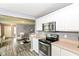 Bright kitchen with stainless steel appliances and an open layout at 5775 Bluff View Ln, Whitestown, IN 46075