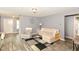 Cozy living room with comfortable seating and a stylish rug at 5775 Bluff View Ln, Whitestown, IN 46075