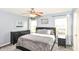 Calm main bedroom with a ceiling fan and soft gray tones at 5775 Bluff View Ln, Whitestown, IN 46075
