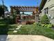 Inviting backyard deck with a pergola, perfect for outdoor relaxation and entertaining at 5786 N Delaware St, Indianapolis, IN 46220